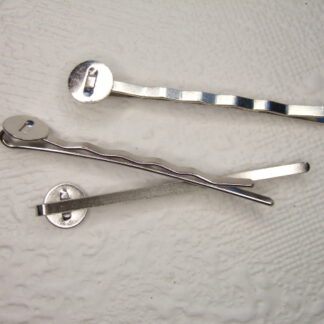 Metalen schuifspeldje met pad